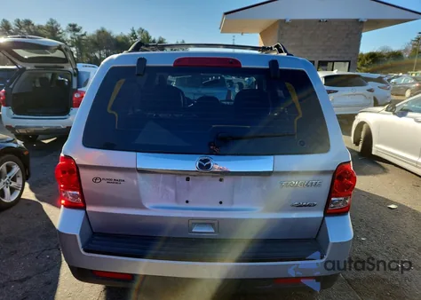 2011 Mazda Tribute I z USA, uszkodzony, nr VIN 4F2CY9C72BKM00734